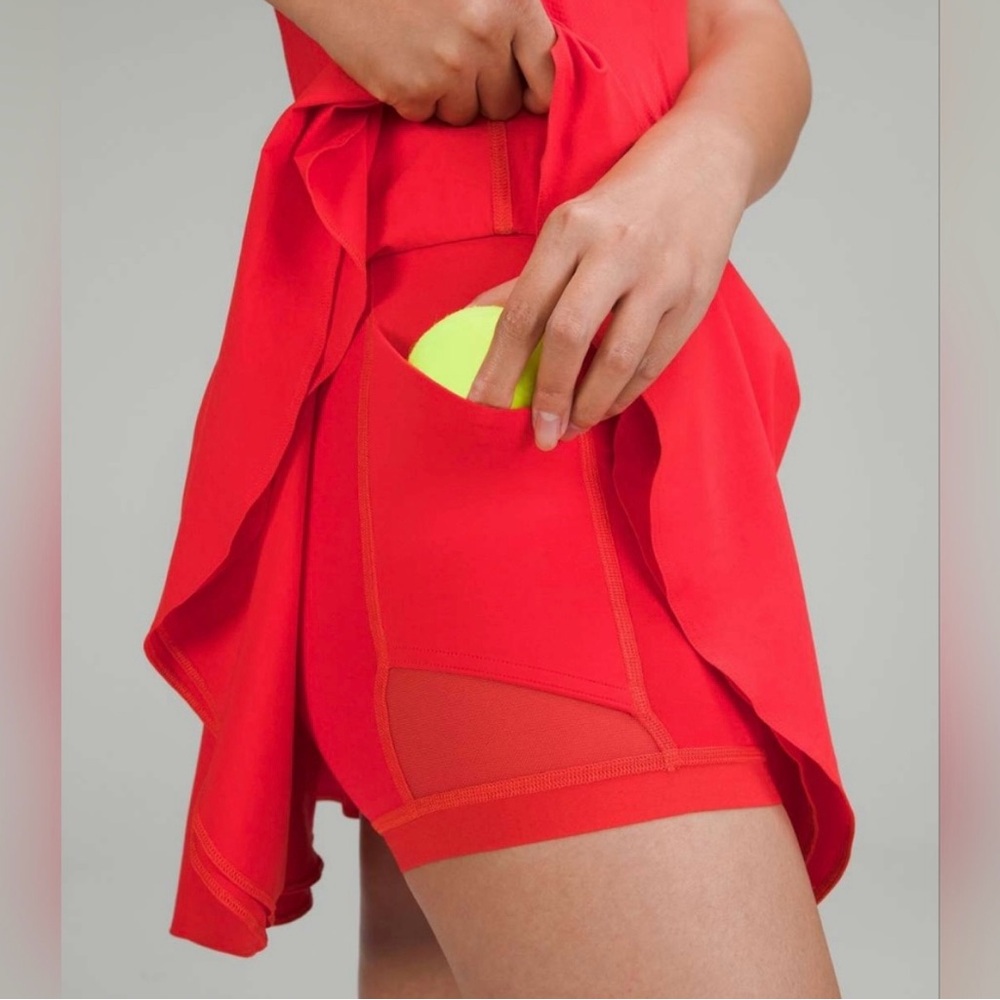 Lululemon Court Rival 14” Skirt in a vibrant Coral color - Picture 2 of 12